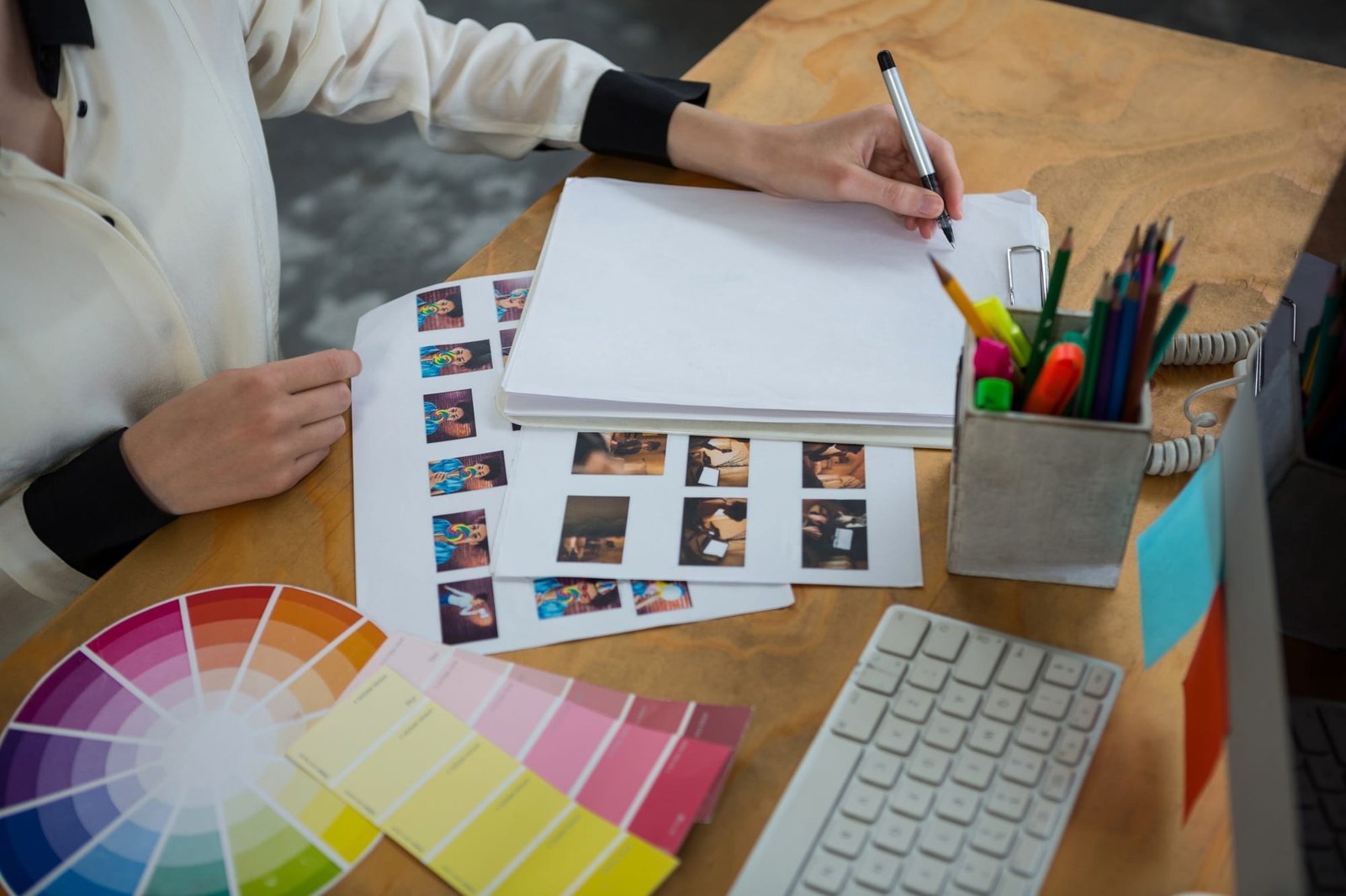 Female graphic designer working at desk